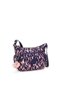 Shoulder bag in a floral pattern featuring pink and navy colors, made of durable fabric, with a front zipper pocket and a plush keychain.