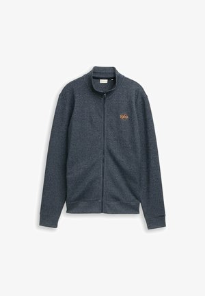 Grauer Kapuzenpullover mit Reißverschluss, strukturierter Stoff, hohem Kragen und einem orangefarbenen "1962"-Logo auf der linken Brust. Mit eng anliegenden Bündchen und Saum ausgestattet.