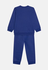 Puma MINICATS CREW JOGGER UNISEX SET - Trening - lapis lazuli