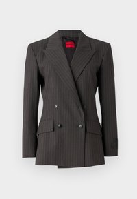 Blazer gris anthracite à double boutonnage avec un motif à rayures. Présente de grands revers, des boutons noirs et des poches latérales. Étiquette visible à l'intérieur.