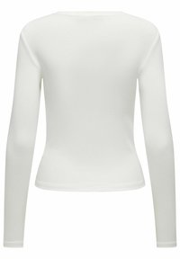 Haut blanc à manches longues avec une coupe ajustée, doté d'un décolleté rond et d'une texture lisse et douce. Aucuns motifs ou ornements visibles.
