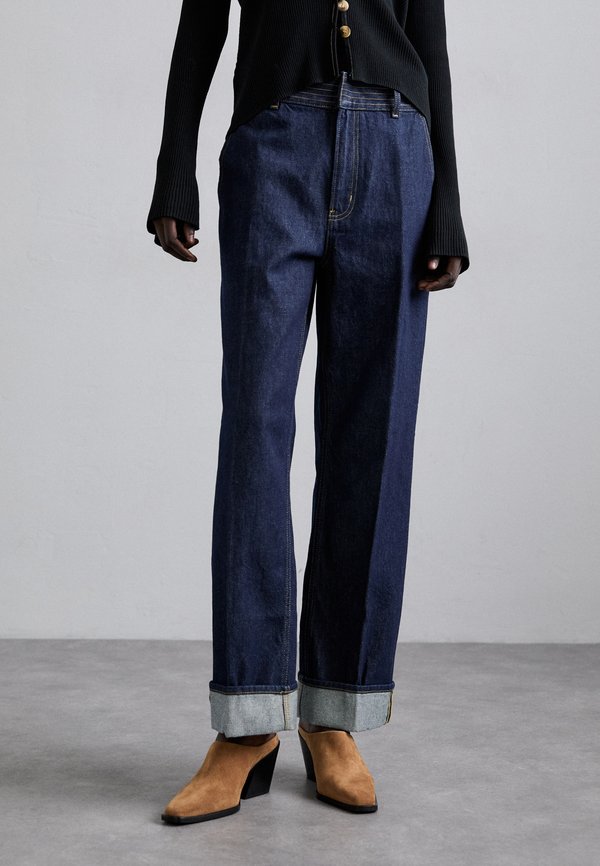 THE TRAPUNTO TROUSER - Relaxed fit jeans - rins