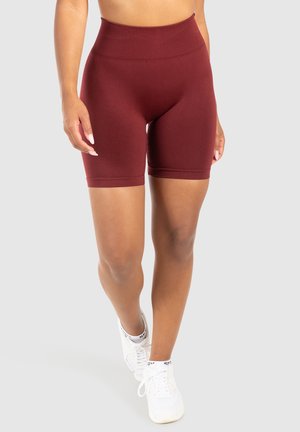 Bordeaux hoge taille sportshorts van rekbaar materiaal, met een aansluitend ontwerp dat tot halverwege het bovenbeen reikt.