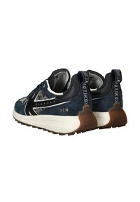 Pair of blue and black suede sneakers with white soles, leopard print accents, "BCN" text, and branded heel pull tabs.
