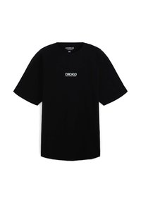 T-shirt nera oversize in cotone con maniche corte. Presenta una stampa bianca con la scritta "CHICAGO RAW MUSIC SCENE" sul petto.