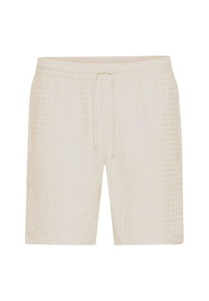 Lichtbeige shorts gemaakt van textuurstof met een gewatteerd patroon. Voorzien van een elastische tailleband en een verstelbaar koordje.
