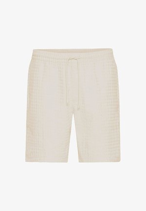Hellbeige Shorts aus strukturiertem Stoff mit einem gesteppten Muster. Der elastische Bund und die verstellbare Kordel sorgen für eine bequeme Passform.