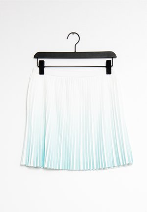 White pleated skirt with light blue gradient hanging on black clip hanger against white background.