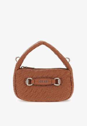 Barna szövet táska, kerek fogantyúval, cipzáras záródással és ezüst kiegészítőkkel. Az elején egy kis, domború márkajelzés található egy bőrcímkén.