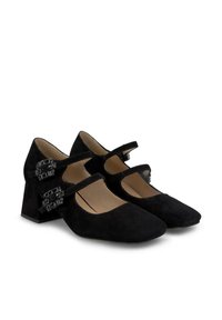 Scarpe Mary Jane nere in suede con punta quadrata, tacco medio a blocco e due cinturini regolabili con eleganti accentuazioni in metallo argenteo.
