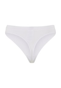 String en coton blanc avec une texture côtelée, un design minimaliste, des côtés étroits et une taille sans couture pour plus de confort.