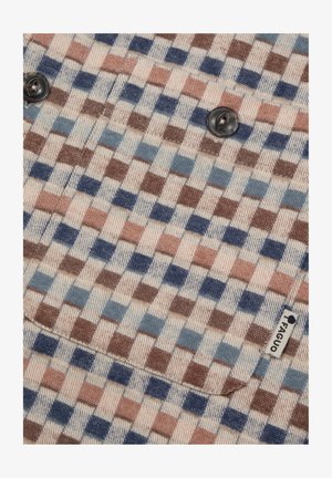 Tessuto con motivo caratterizzato da quadrati beige chiaro, blu e marroni. Due bottoni neri sono visibili sulla parte anteriore. Include un'etichetta del marchio sul lato.