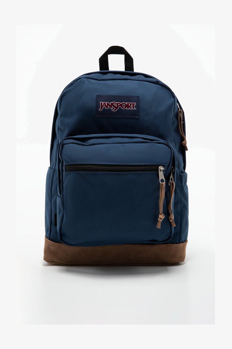 Mėlynasis "Jansport" kuprinė su rudąja zomšinėm apačia, priekinė zip užtrauktuko kišenė ir reguliuojamos paminkštintos petnešos. Viršuje yra logotipo pleistras.