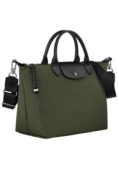 Green nylon handbag with black leather accents, dual top handles, detachable strap, and a textured finish. Features a snap closure and pocket.