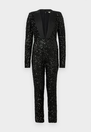 Juodas viso ilgio šokinėjimo kostiumas, padengtas blizgiais pailgintais sequin'ais, su ilgam rankovėmis ir plačiu satino apykakle.