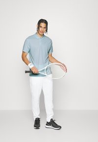 Nike Performance SOLID - Polo - glacier blue/white