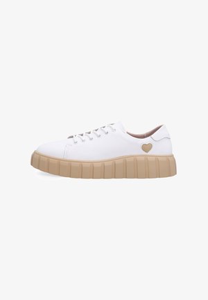 White low-top sneaker with beige thick ridged sole and heart-shaped cutout near heel on side.