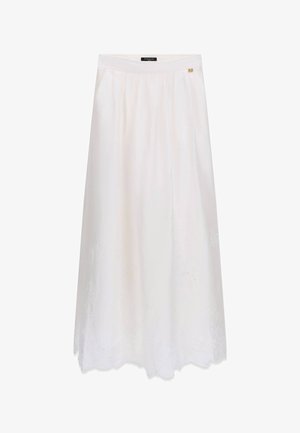 Jupe midi blanche avec ourlet festonné et subtils détails floraux brodés, dotée d'une taille cintrée et d’une petite épingle dorée avec logo.