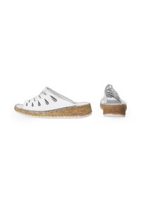 White open-toe slide sandals with cut-out design, cork midsole, and textured rubber outsole. Features a strappy upper for ventilation.