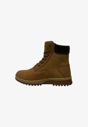 Tan leather ankle boot with black collar, lace-up design, and textured rubber sole. Features reinforced stitching and contrasting sole color.
