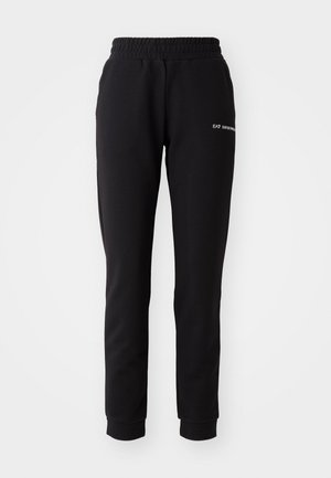 Zwarte joggingsbroek gemaakt van zachte stof, met een elastische tailleband en boorden. Subtiele logodetail aan de voorkant.