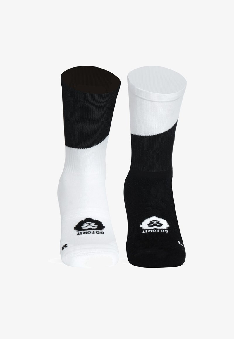 Černobílé crew ponožky s žebrovanou texturou. Každá ponožka má odlišnou barvu a na kotníku se nachází logo v kontrastní barvě.