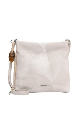 Beige olkalaukku, jossa hillitty geometrinen kuvio, säädettävä hihna ja koristeellinen ruskea ovaalinen koriste lähellä metallista hihnalenkkiä.