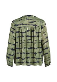 Blouse verte à manches longues avec un motif abstrait noir et blanc, dotée d'un dos plissé et d'un tissu doux et léger.