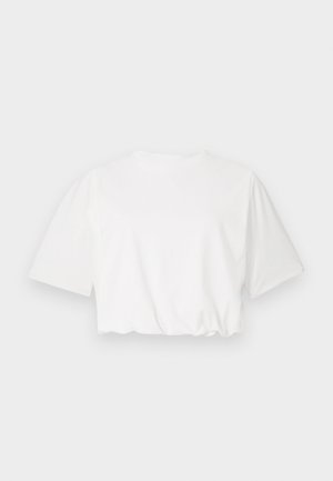 Hvit kortermet t-skjorte med korte pufferm, rund hals og samlet nederkant, laget av myk bomull.