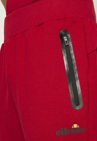 Ellesse OSTERIA - Calças de fato de treino - burgundy