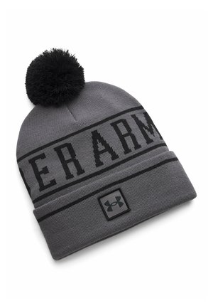 Gray knit beanie with black pom-pom, black "UNDER ARMOUR" text band, and a small black Under Armour logo patch on the cuff.