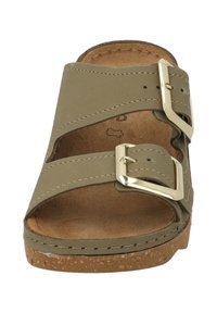 Olive green slide sandal with two adjustable straps and gold buckles. Cork footbed with a textured surface and rubber outsole.