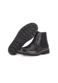 Zwarte leren enkellaarzen met elastische zijpanelen, een gestructureerde rubberen zool en een kleine hak. Kenmerkt een contrasterende bruine stikselafwerking.