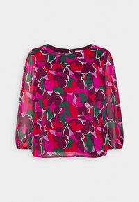 Blouse fleurie en tissu transparent violet, avec des motifs audacieux rouges, roses et verts. Manches longues avec poignets élastiques et encolure ronde.