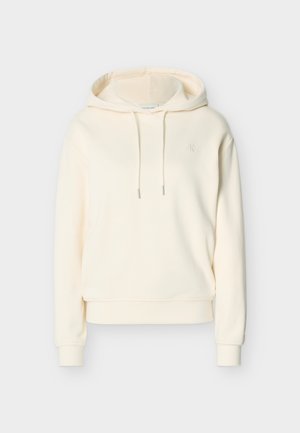 Cremefarbener Kapuzenpullover mit Kordelzug und dezent geprägtem „cK“-Logo auf der Brust, langen Ärmeln sowie gerippten Bündchen und Saum.