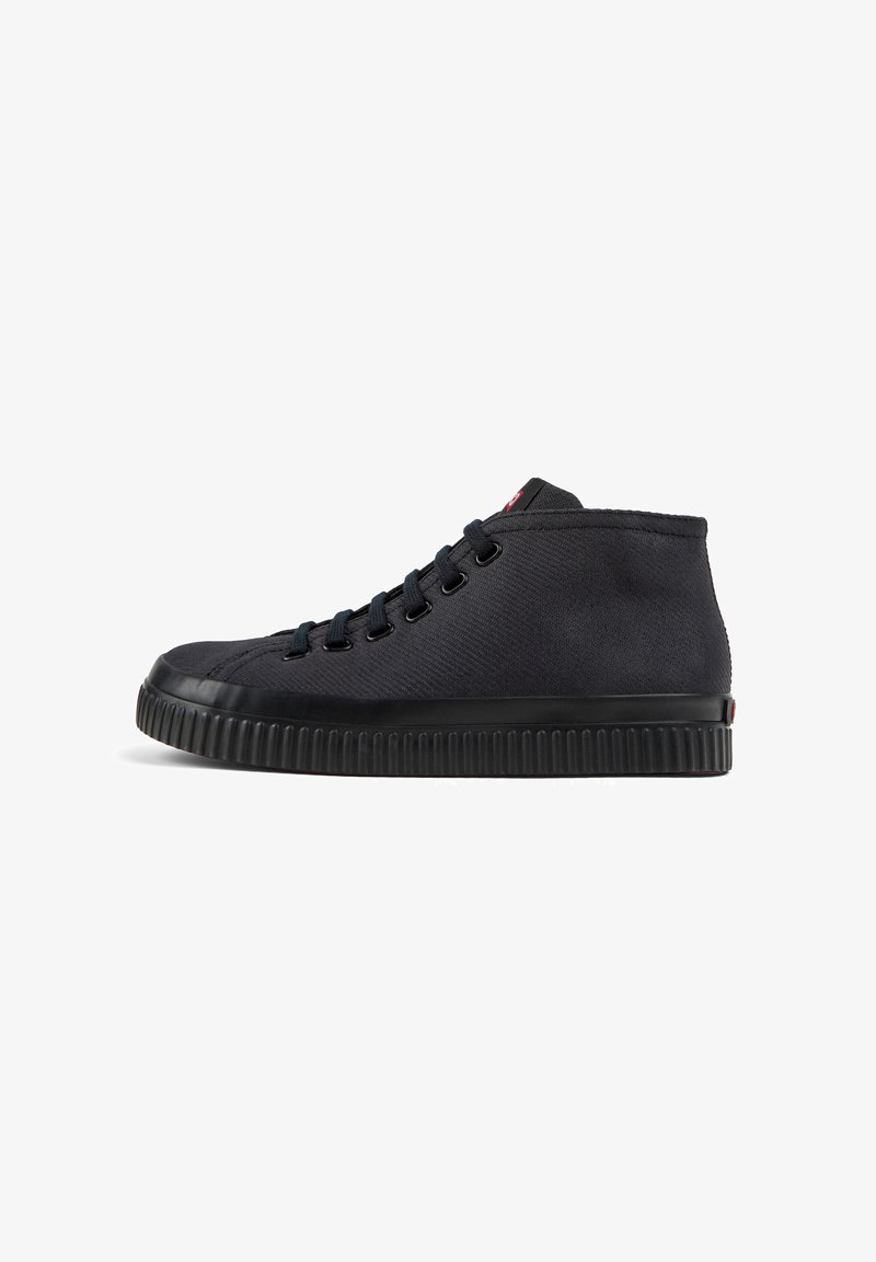 Black high-top sneakers with textured fabric, rubber sole, and round toe. Features a lace-up design and subtle brand accent on the side.