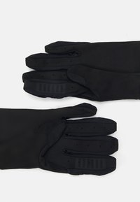 Μαύρα γάντια με κομψό σχέδιο, φτιαγμένα από μαλακό, ελαστικό υλικό, με υφή για καλύτερη πρόσφυση στις παλάμες και τα δάχτυλα.