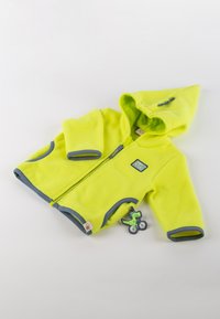 Yellow fleece jacket with a hood, blue trim, and two side pockets. Features a zipper and a tag with a cartoon dinosaur on a bicycle.