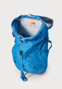 Blue backpack made of durable fabric with a drawstring closure, adjustable straps, one side pocket, and a gray padded interior.