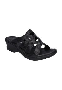 Sandali slip-on in pelle nera con cinturini incrociati, tacco inclinato e soletta imbottita. Presenta dettagli di cucitura sottili.