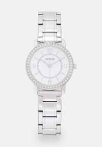 Silver wristwatch featuring a round face with a white dial, crystal accents around the bezel, and a metallic link bracelet.