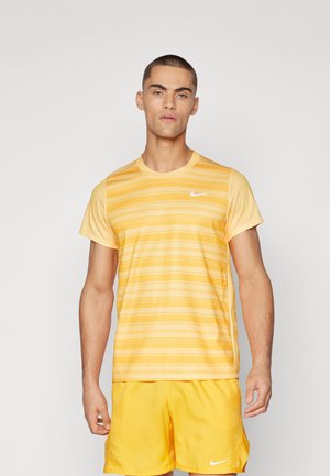 Yellow athletic t-shirt with horizontal stripes, short sleeves, and a round neckline. Features white Nike logo on the chest.