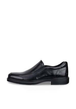 Zapato de vestir de hombre en piel negra, sin cordones, con tacón bajo, punta cuadrada y detalles sutiles de costura en los laterales y el talón.