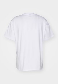 White cotton t-shirt, short sleeves, round neckline, relaxed fit, solid color, smooth texture, no visible logos or patterns.