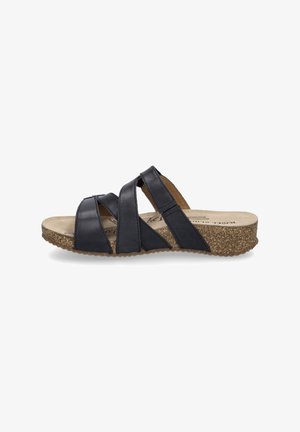 Zwarte leren slidesandalen met kruislings gespen, een bruine gevoerde voetbed en een lichte, gestructureerde kurken zool. Ontworpen voor comfort.
