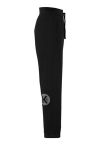 Sorte sweatpants lavet af glat stof, med en snøre i taljen, sidelommer og en cirkulær logo detalje i hvid på venstre ben.