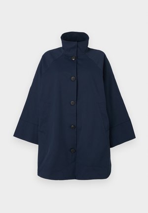 Navy blue waterproof coat with a high collar, full front button closure, two side pockets, and short wide sleeves. Smooth, matte texture.