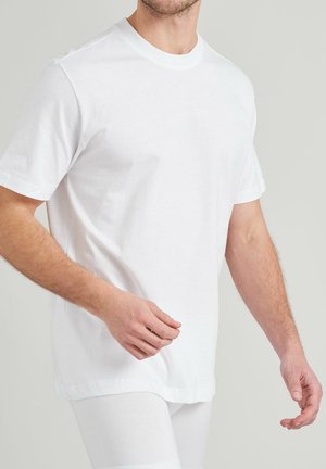 White crew neck t-shirt, short sleeves, made of soft cotton. Features a relaxed fit with straight hem, minimal seams, and smooth texture.