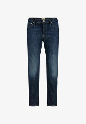 Temno modre oprijete kavbojke z rahlim bledenjem na stegnih, slog s petimi žepi, zapiranjem na gumb in zankami za pas.