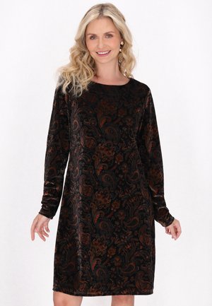 Langärmliges schwarzes Kleid mit einem Paisleymuster in erdigen Farbtönen. Aus weichem Stoff gefertigt, hat es einen runden Ausschnitt und einen lockeren Schnitt.